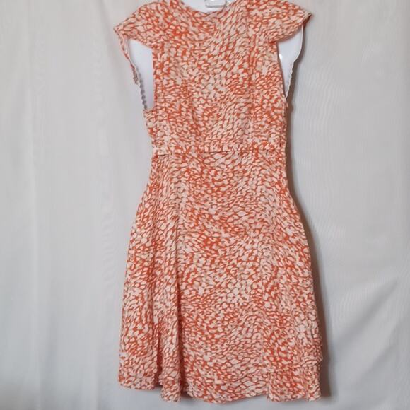 FREE PEOPLE French Quarter Orange Ruffle Print Mini Wrap Dress. Size XS. - Picture 11 of 15
